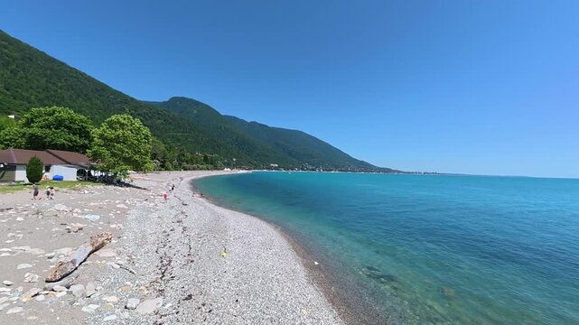 View of the pebbly beach and the Black Sea coastline in the Old Gagra district. Abkhazia