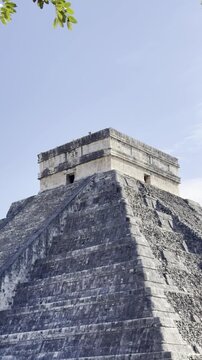 Mayan pyramid of chichen itza under a clear blue sky in mexico. Chichen itza