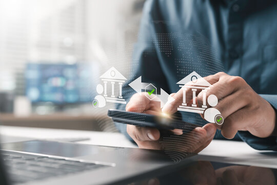 Online banking, digital finance, money transfer security concept. Businessman using smartphone with mobile banking application for transfer deposit and global fintech transaction. Finance business.