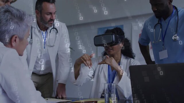 Woman medic in VR headset starting sim with pinching, sweeping, digits overlay guiding medical team