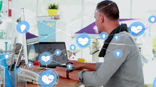 Designer typing keys, causing blue heart pin icons linking overlay covering view, mapping network