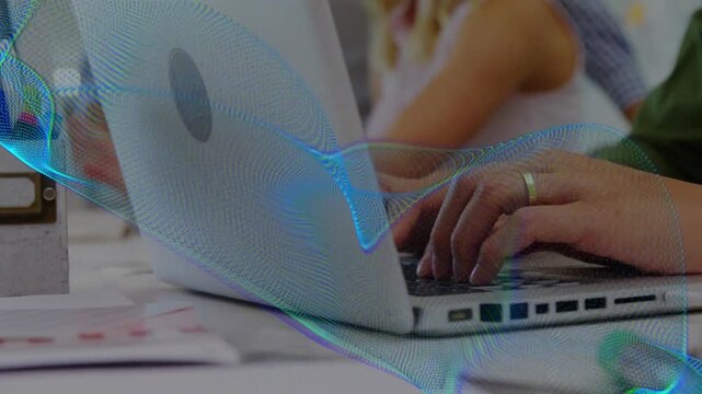 Office typist entering frame and typing, wave tracking laptop hands, zooming to ring for teamwork