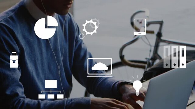 Man bringing hands to laptop and typing at window, animated business icons shifting for remote work