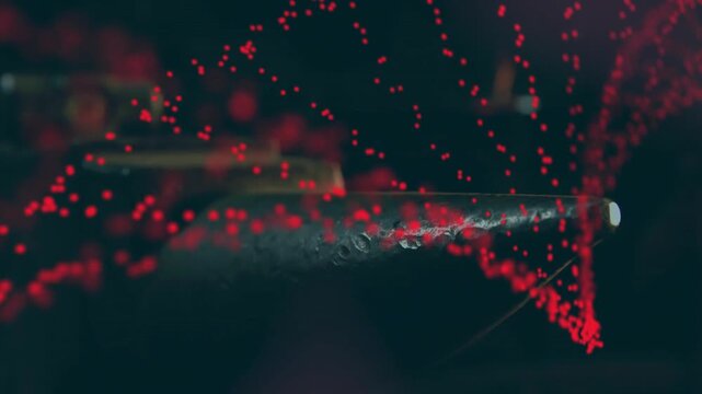 Nozzles staying still while dots clustering at right tip aligning into red arcs for technology