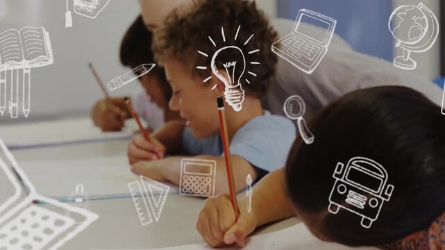Teacher leaning over boy giving help as students writing with pencils doodles floating