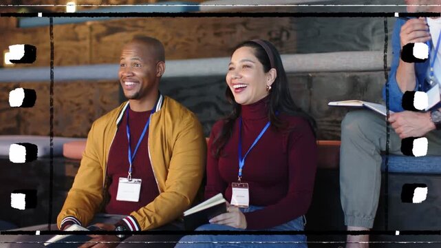 Two participants responding to off-camera cue during seminar, film-strip overlay accenting laughter