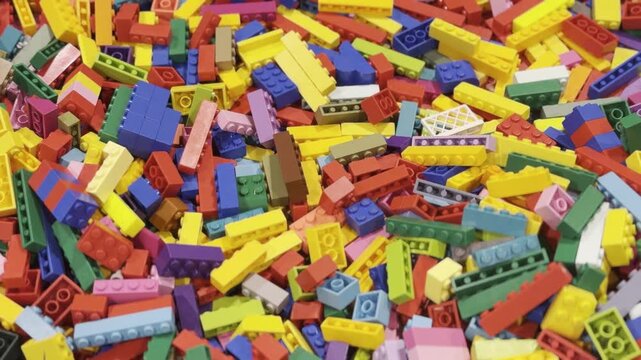 Colorful pile of toy building bricks background