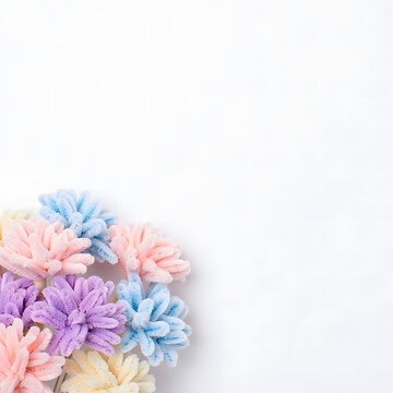 Fluffy Pastel Pipe Cleaner Flower Bouquet with Copyspace on White Background
