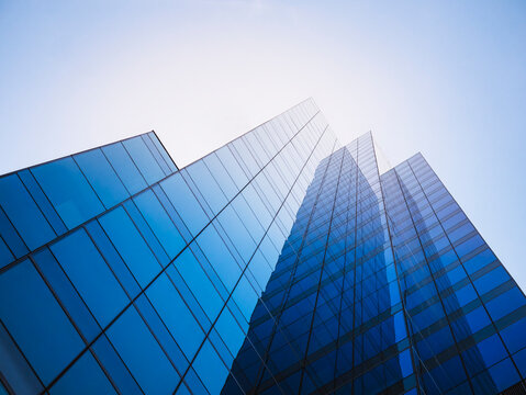 Architecture details Glass wall Modern building exterior Abstract background Low angle view