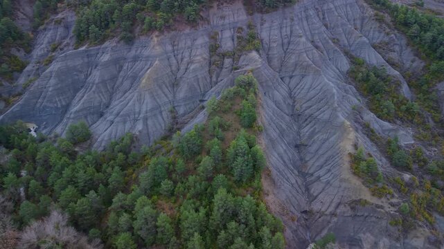 Aerial drone view of the winter landscape of erosion-covered ravines in the Alto Gallego region, Huesca province, Aragon, Spain, Europe