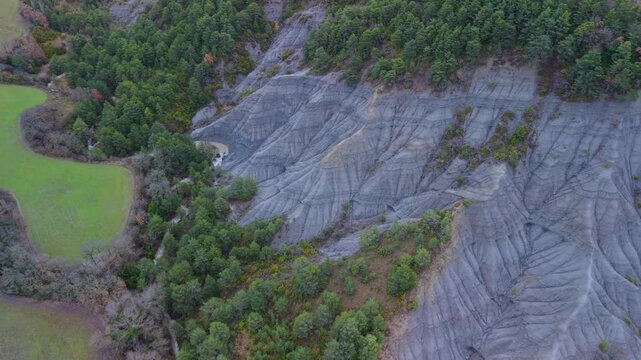 Aerial drone view of the winter landscape of erosion-covered ravines in the Alto Gallego region, Huesca province, Aragon, Spain, Europe