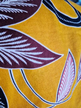 Traditional Indonesian Batik Fabric with Yellow and Floral Motif
