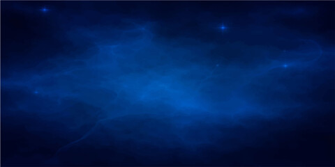 A captivating deep blue space, dotted with subtle stars, evokes the mystery and vastness of the cosmos, ideal for backgrounds or design elements. © DAKU MOHARAJ