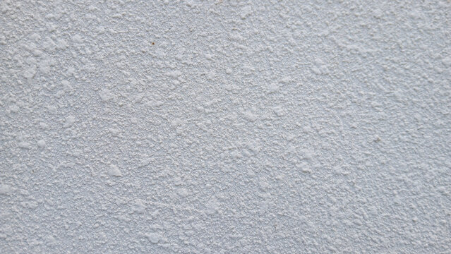 full frame background of white ceiling texture with rough acoustic spray finish for interior renovation