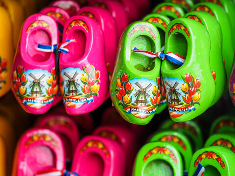 Traditional Dutch wooden clogs souvenir with windmill and tulip design