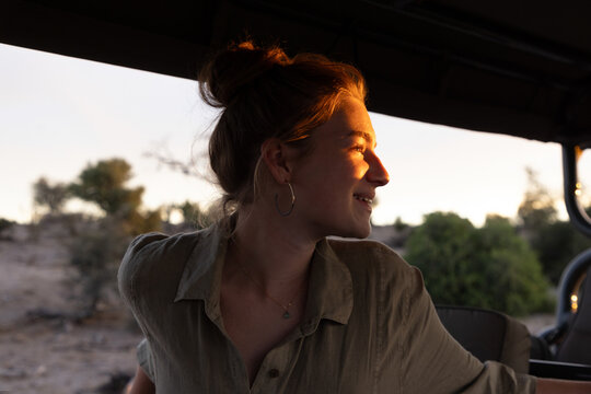 teen age girl experiencing a safari in the Okavango Delta, Botswana, Africa