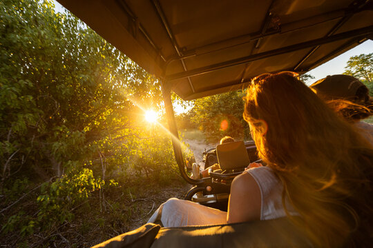 teen age girl experiencing a safari in the Okavango Delta, Botswana, Africa