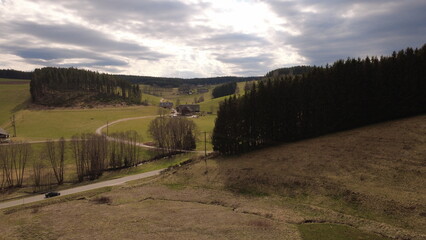 Fototapeta premium Aerial view rural landscape in spring, fields and village Germany
