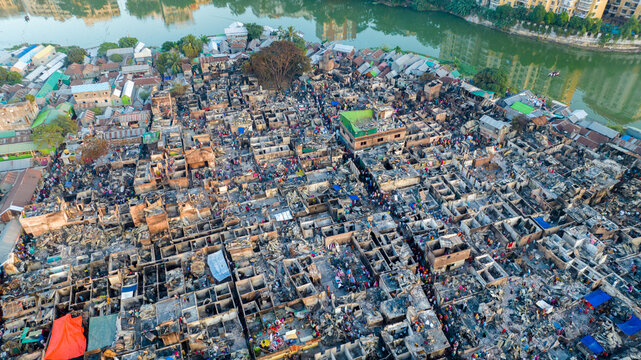 Aerial view of densely packed buildings with a mix of vibrant and muted tones, showcasing the urban landscape, Dhaka, Dhaka Division, Bangladesh.