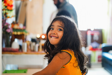 Indian female kid smiling on camera while wearing sari dress  - Childhood, asian culture, religion...