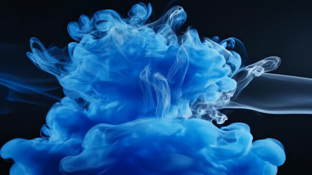 Blue ink cloud in liquid for commercial backgrounds, digital design, and advertising