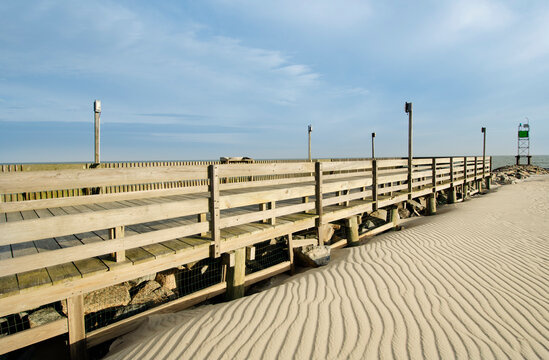 Empty boardwalk at Bass River on sunny day