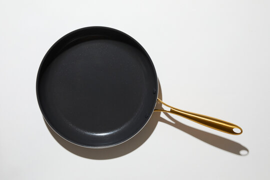 Torn blue glitter paper on white background