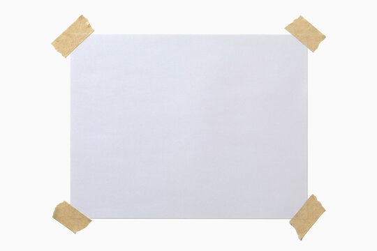Blank paper taped to white background