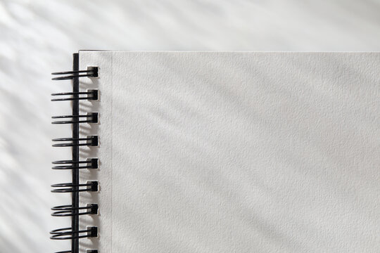 Close-up of open  spiral notebook