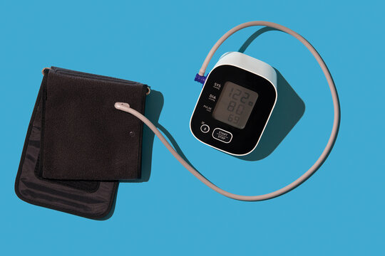 Blood pressure gauge on blue background