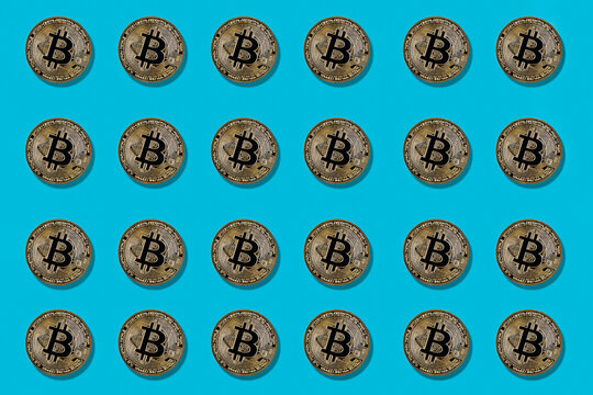 Multiple bitcoin on blue background