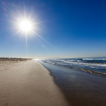 Morning sun on clear sky above Santa Monica Beach