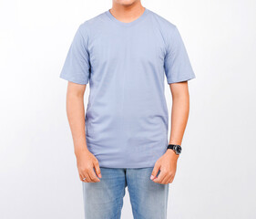 Obraz premium Male body wearing a plain grey blue t-shirt and blue jeans, with a white background