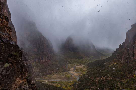 Gray clouds covering Zion Canyon during snowstorm