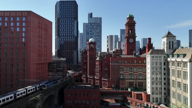 Static Aerial Video Of Trains Moving In Opposite Directions Through The Heart Of The City