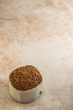 Whole flaxseed in a ceramic bowl 