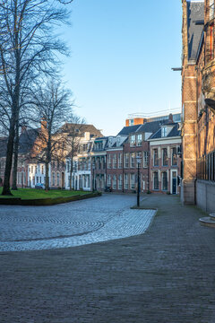 Street view of a place with old houses and buildings in Groningen