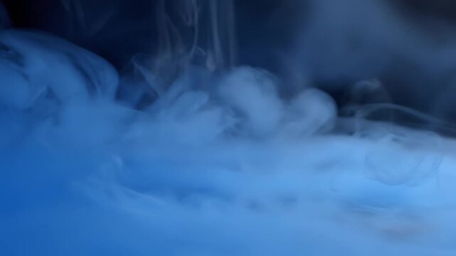 Blue smoke abstract background with dark clouds