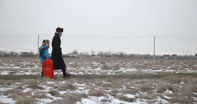 Man and kid boy go for walk. Dad and son play outside. 4K 10-bit
