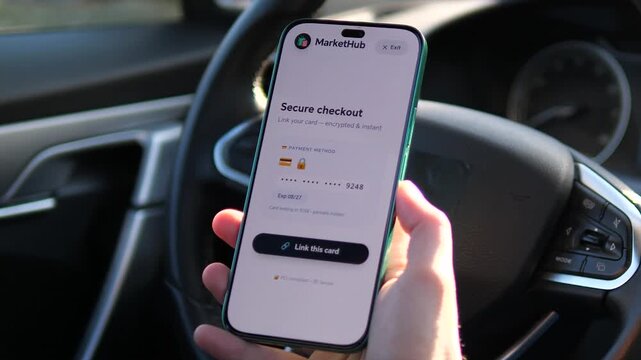 Close-up of a user linking a credit card on a mobile shopping app in a car. Sequence shows secure checkout, loading animation, and successful card confirmation. Perfect for fintech and e-commerce