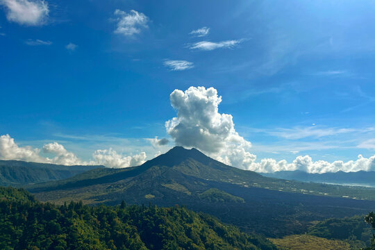 Kintamani, Bangli, Bali, Indonesia - March 25 2026: Mount Batur is an active volcano in Kintamani, Bangli, Bali, which is famous for its sunrise views and the largest caldera lake.