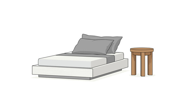 Low-profile modern bed dressed with soft grey pillows and a matching runner sits elegantly next to a small round wooden stool in a minimalist bedroom.