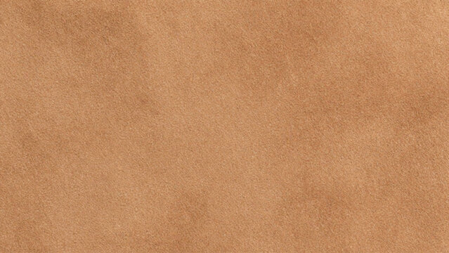 A close up view of textured light brown suede fabric background