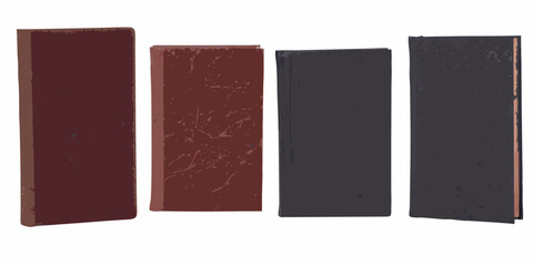 Four old books stand upright displaying varying shades of color © Debashis