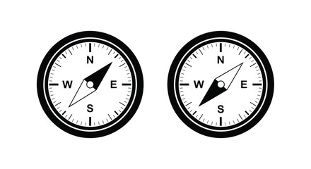 Two black and white compasses are displayed both pointing towards the northeast direction on a white background © grvect02