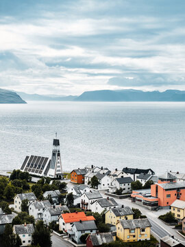 Hammerfest town in northern Norway -  aerial view traditional wooden houses rooftops with sea view summer scenery in Finnmark, famous travel destination Scandinavian landmarks