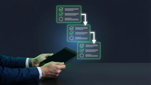 A person using a tablet to manage sequential checklist tasks and workflow steps.