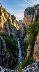 Obraz premium Majestic Canyon Landscape with River Flowing Through Rocky Terrain.