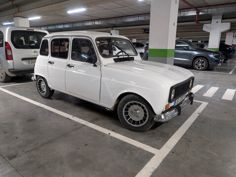 Palma de Mallorca, Spain &ndash; April 07, 2026: Classic white Renault 4L Limousine, Spanish version, parked in supermarket underground parking garage. Nostalgic vintage french brand vehicle from 1960s. 