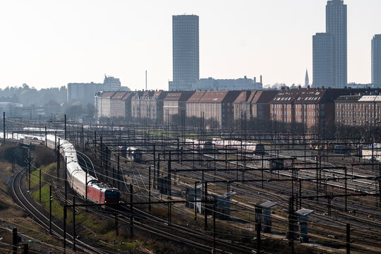 Clean commercial aerial style view of railway tracks yard and trains with infrastructure logistics urban transport in Copenhagen Denmark